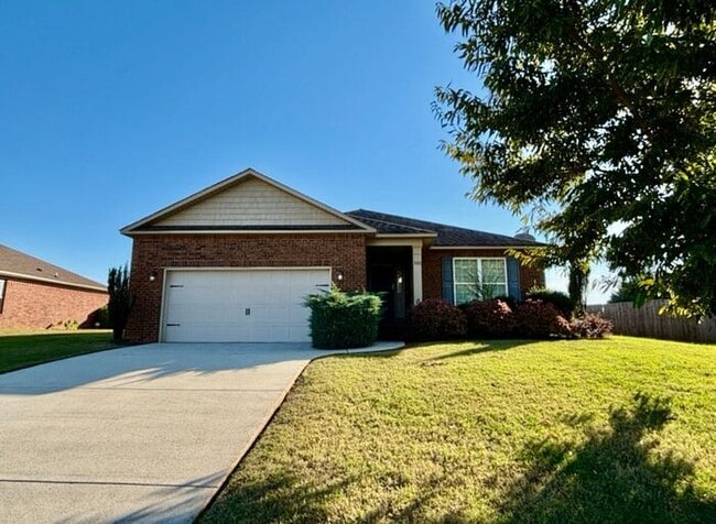 Building Photo - Fenced Yard with a HUGE Back Yard