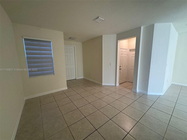 Photo - 10826 W 33rd Way Townhome