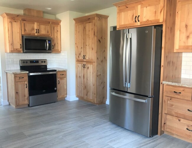 Photo - Beautiful Remodeled Home with Huge Bonus Space and Private Fenced Backyard!