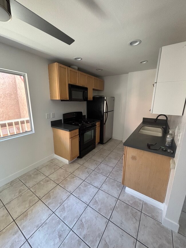 Photo - 6600 Warner Ave Unidad 215