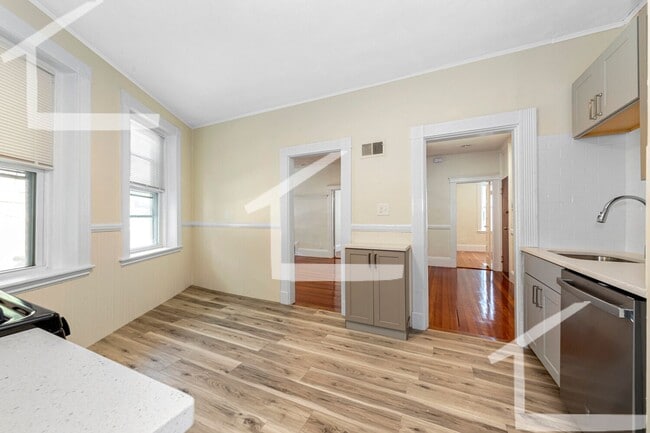 Photo - 9/1 Fully renovated 3BR in Oak Sq, w/d in unit!