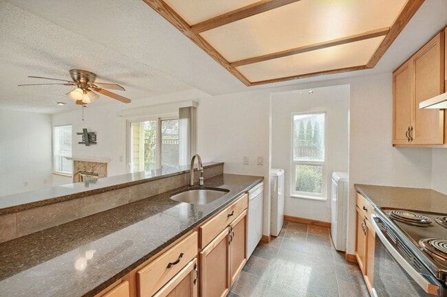 Building Photo - AVAILABLE NOW! 2BR/2BA Condo – Awesome Location! Glossy Hardwoods, Granite Countertops, W/S/G Inc...