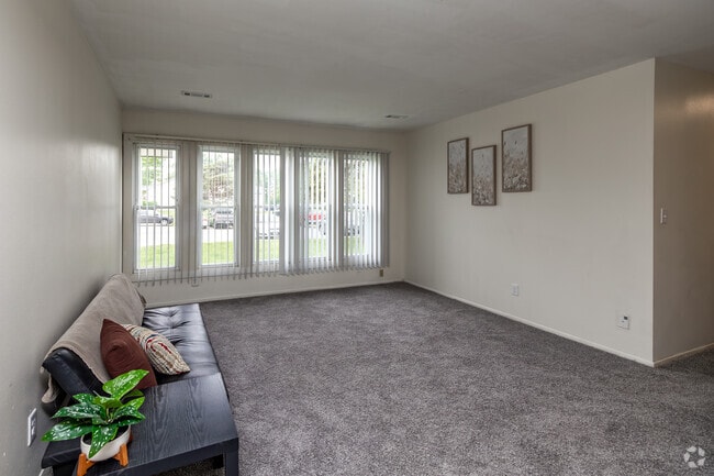 3BR, 2BA - 1,026SF - Living Room - Alpine Manor Apartments