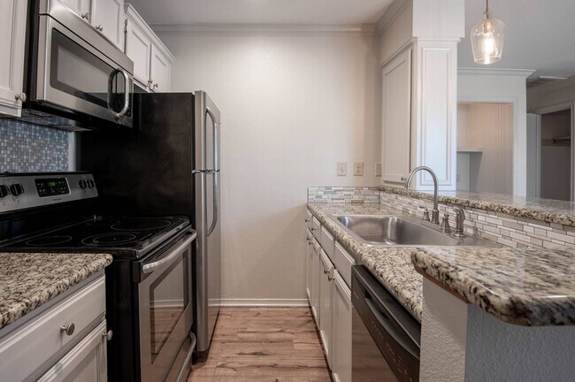 Kitchen with granite countertops