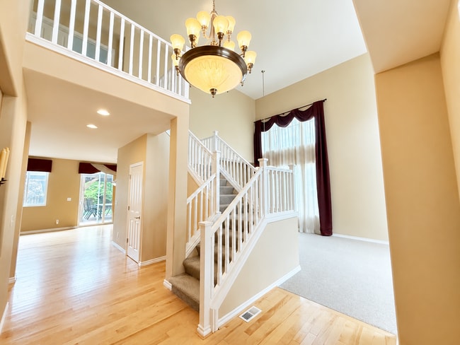 Photo - Spacious 4-Bedroom Home with Bonus Room, Trex Deck & Pergola in Prime Maple Valley