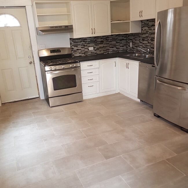Photo - Spacious Main Floor 1 Bedroom Unit 1