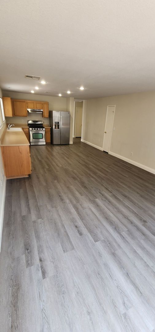 Photo - HOUSING CHOICE VOUCHER APPROVED! Spacious Henderson Home with Open Layout & Endless Backyard Pote...