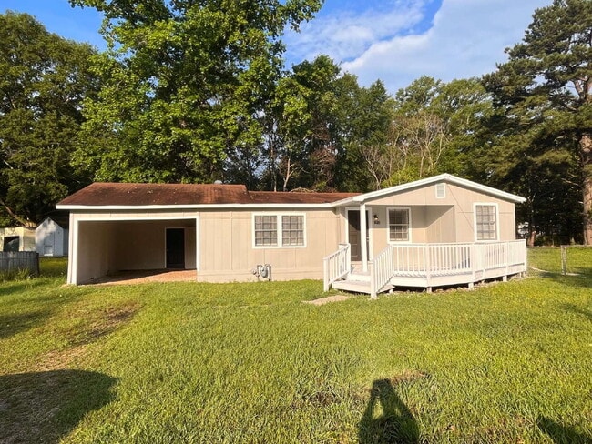 Photo - Cozy 3BR Rental in Pearl, MS – Spacious Ya...