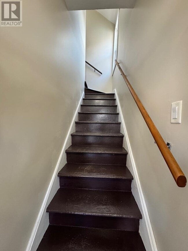 Photo - 1 Bedroom Upper-Level Unit – Laundry Hooku... Unit B