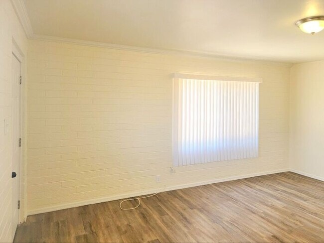 Photo - Spacious 2-Bed, 1-Bath Home | Large Shared Yard & Prime Commuter Access