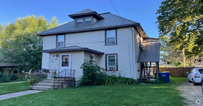 Parking on right side with stairwell - 416 E Decker St Unit Upper Rental