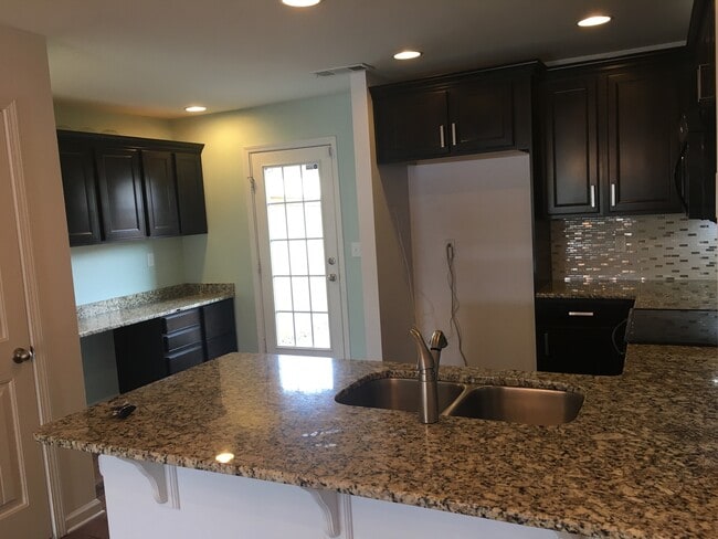 Photo - Townhome in Villages of Riverwood, Upgrades include Granite, Hdwd Floors, 1 Car Garage, Community...