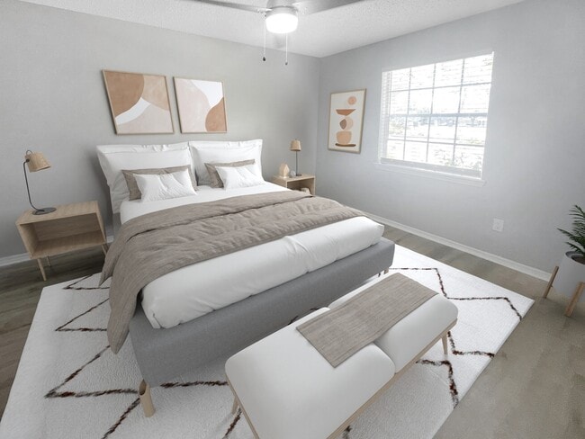 Bedroom with wood style flooring and ceiling fan