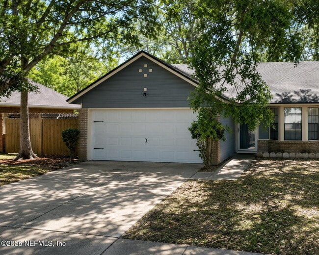 Building Photo - 3/2 Updates Galore! Move-In Ready with Granite Kitchen, Remodeled Baths & Private Backyard