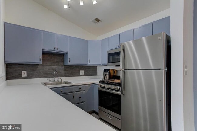 Photo - 645 Constellation Square SE Unit J