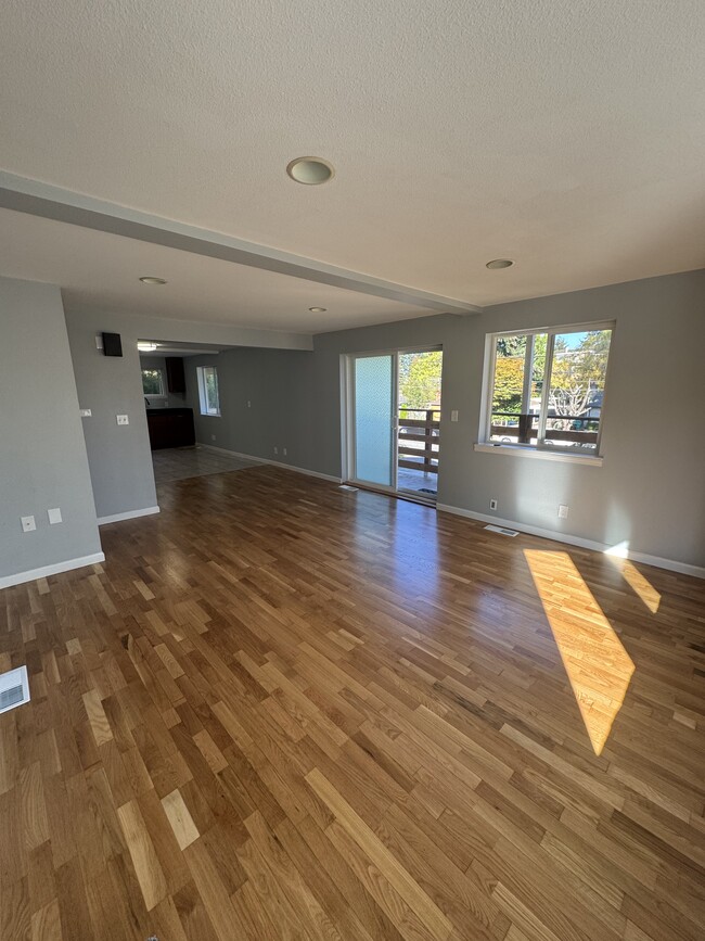 Living room/dining room, door leading to the deck