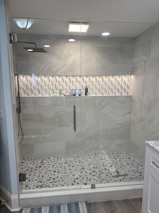 Newly remodeled Master shower with all new tile and combo rain shower - 1031 1st St S Unit 403 Melissa Schultz