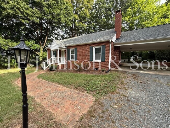 Photo - Spacious 3 Bedroom Home with Primary Suite on Main Level and 2-Car Carport