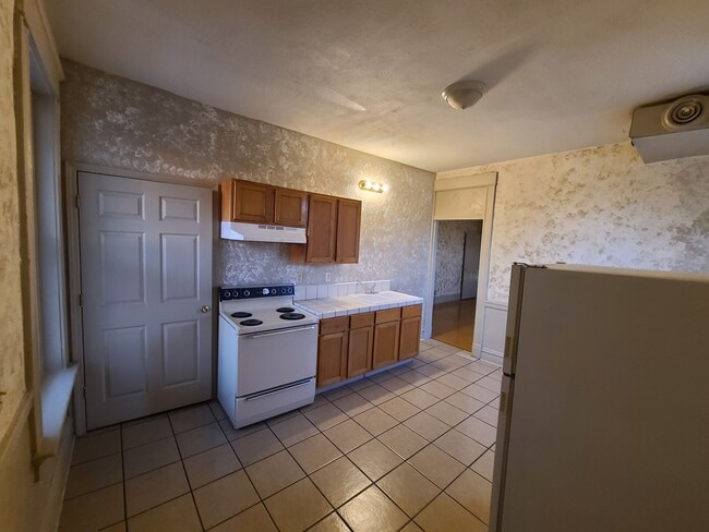 Kitchen. - 2009 Bryan Ave Unit 2009 Apt A, upstairs