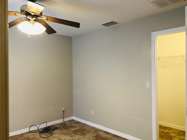 Photo - Experience this Cape Coral 3 bedroom 2 bath duplex with 1 car garage and screened in lanai.