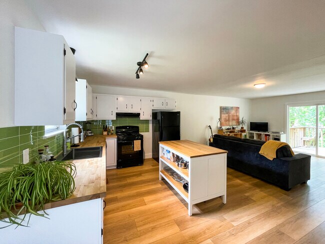 Open plan kitchen and living area. - 328 Pine Ridge Rd Townhome