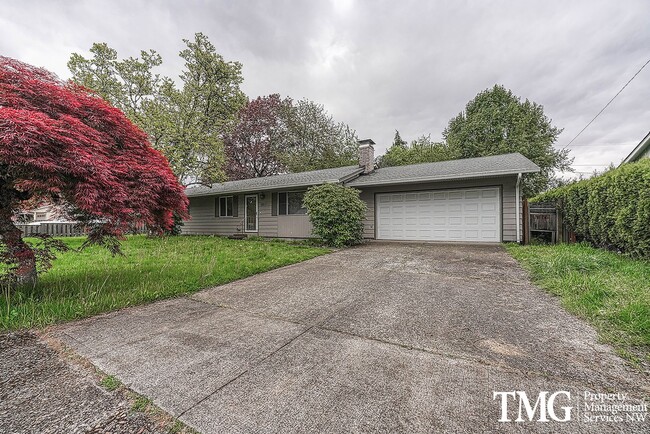 Building Photo - Well-Located Home with Fireplace, Fenced Yard & 2-Car Garage