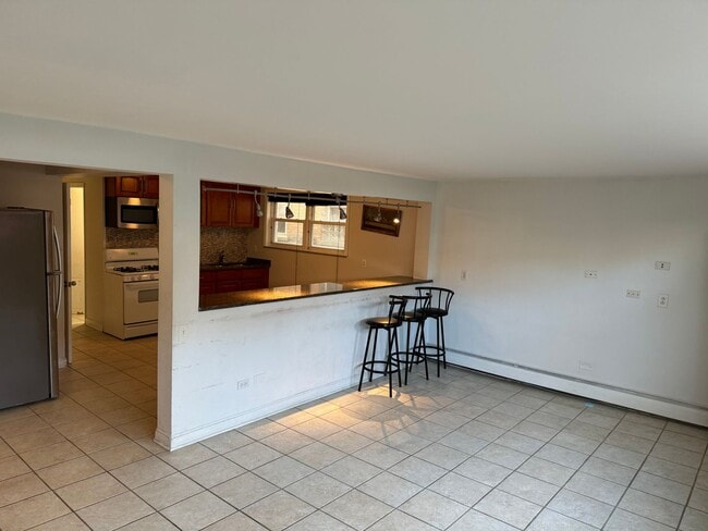 Building Photo - 5539 N Mango Ave Unit B