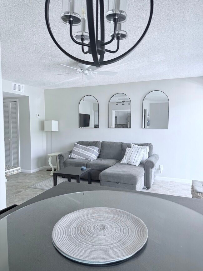 abundant natural lighting, ceiling fans in each room - 5505 N Ocean Blvd Unit 2-102