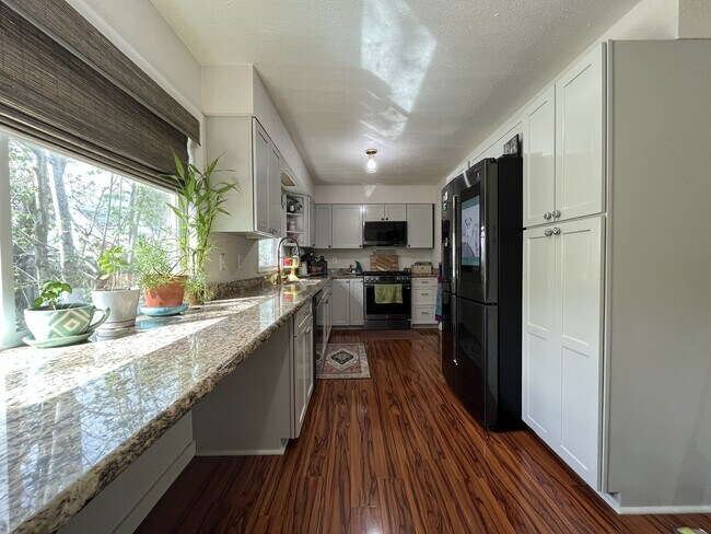 Photo - Comfortable Living with Large Kitchen, Detached Shop & Extensive Outdoor Living