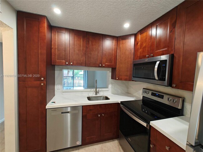 Photo - 8770 Royal Palm Blvd Unit 203-2