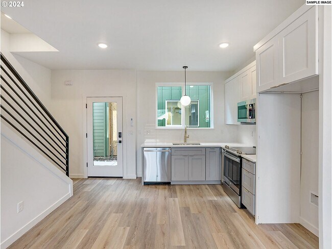 Photo - Inviting Home with Open Living & Stainless...