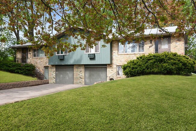 Near great parks, top-rated schools, and plenty of shopping and dining options — and just 15 minutes from both downtown Minneapolis and Saint Paul. - 720 Silver Lake Road NW