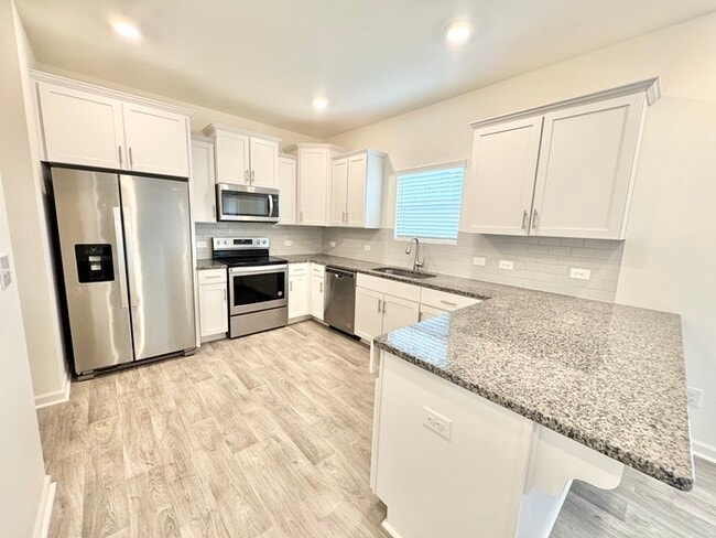 Photo - 3 br 2.5 ba townhome with 1 car garage Rea...