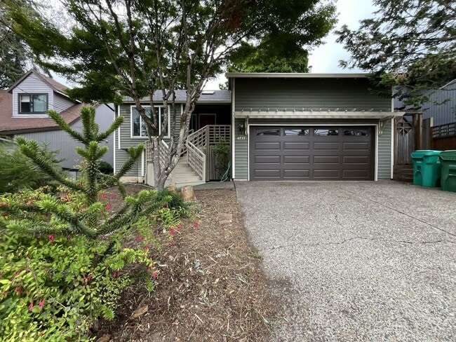 Building Photo - Spacious 3-Bedroom Home with Custom Stone Fireplace, Attached 2-Car Garage & Expansive Backyard i...