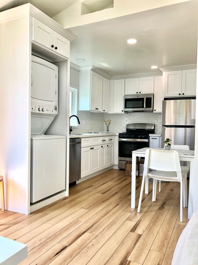 Full-sized Brand New Kitchen with Full-sized In-Unit Laundry!