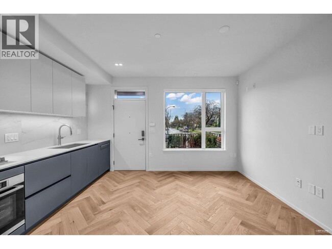 Photo - 775 W 49th Ave Unité 1xx