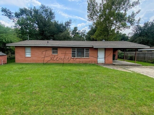 Building Photo - Updated 3BR Brick Home with Covered Carpor...