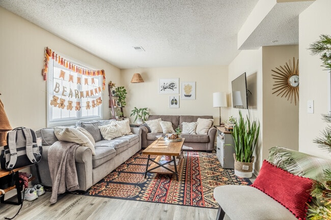 2BR, 2BA - 1,200SF - Living Room - Clarkston Oaks Apartments