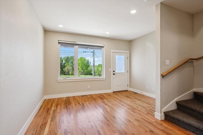 Photo - Modern 4-Bedroom Townhome with Rooftop Deck Near Sloan’s Lake & Light Rail