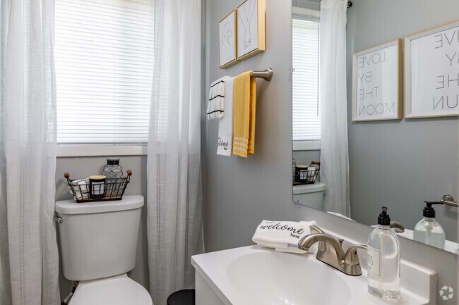 3BR, 2.5BA - 1587SF Half-Bath off Kitchen