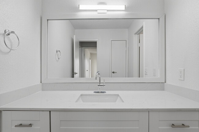 Onebedroom One bathroom large vanity and sink.