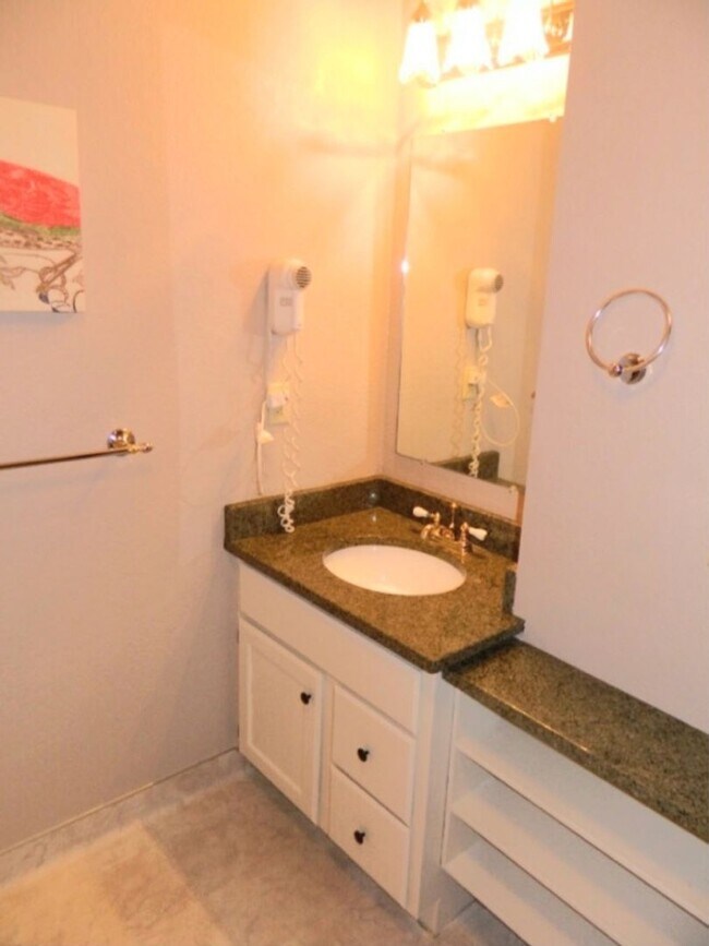 Photo - Perfectly Located Carriage House Condo