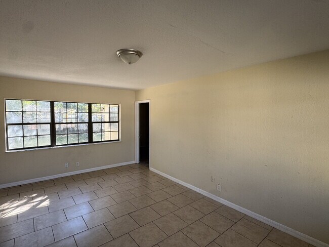 Photo - "Spacious 4-Bedroom Oasis with 2 Baths in Tampa – Your Perfect Family Retreat!"