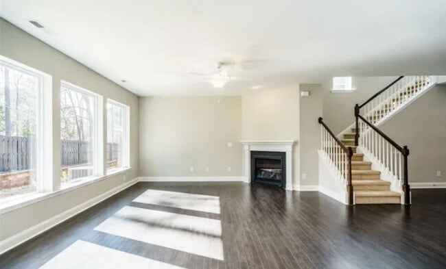 Photo - Beautiful & Open 4 Bedroom + 2.5 bath home with Loft!
