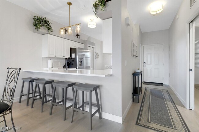 Building Photo - 3830 Sawgrass Way Unit 2944