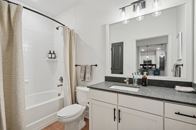 Bathroom with Granite Countertop and Soaking Tub - Linz Charlotte