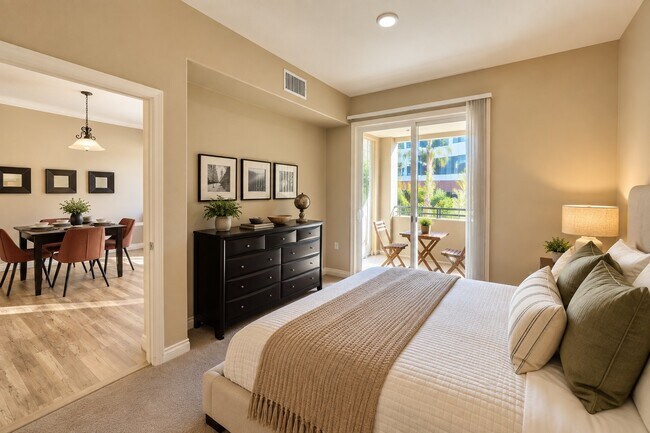 Elevate your living at The Pointe with this serene bedroom oasis, featuring natural light and a cozy vibe. Enjoy your own private balcony, perfect for morning coffee. Explore your new home today and schedule a tour!