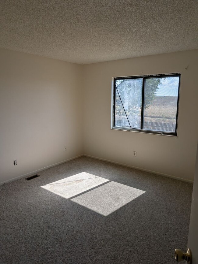 Photo - Widefield side entry bi-level home.