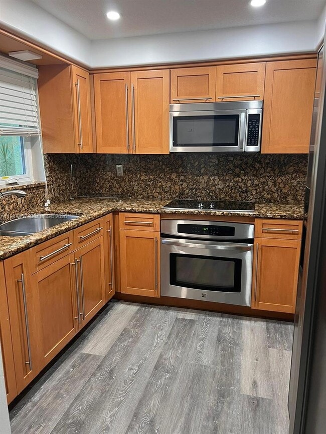 Building Photo - 11163 NW 7th St Unit 104