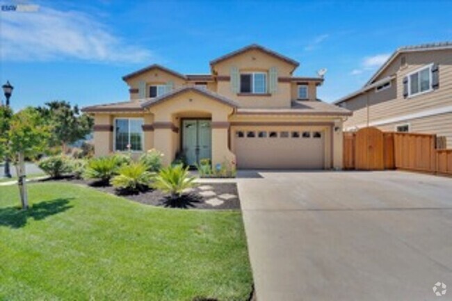 Building Photo - COMING SOON!! Spacious 4-Bedroom Home in O...